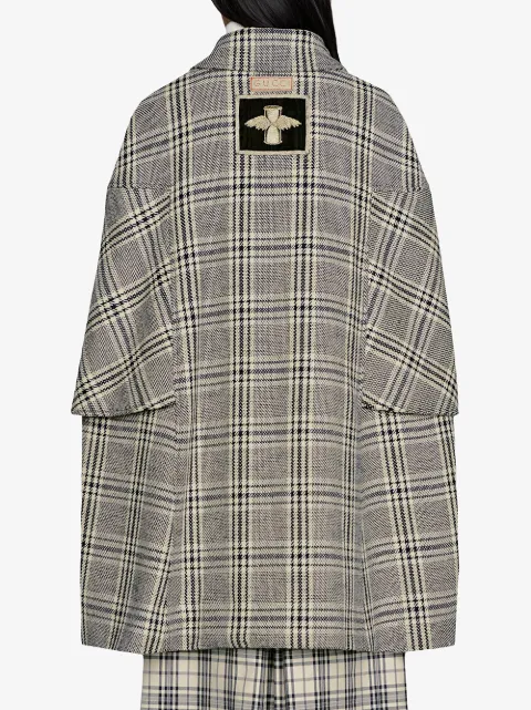 checked cape coat