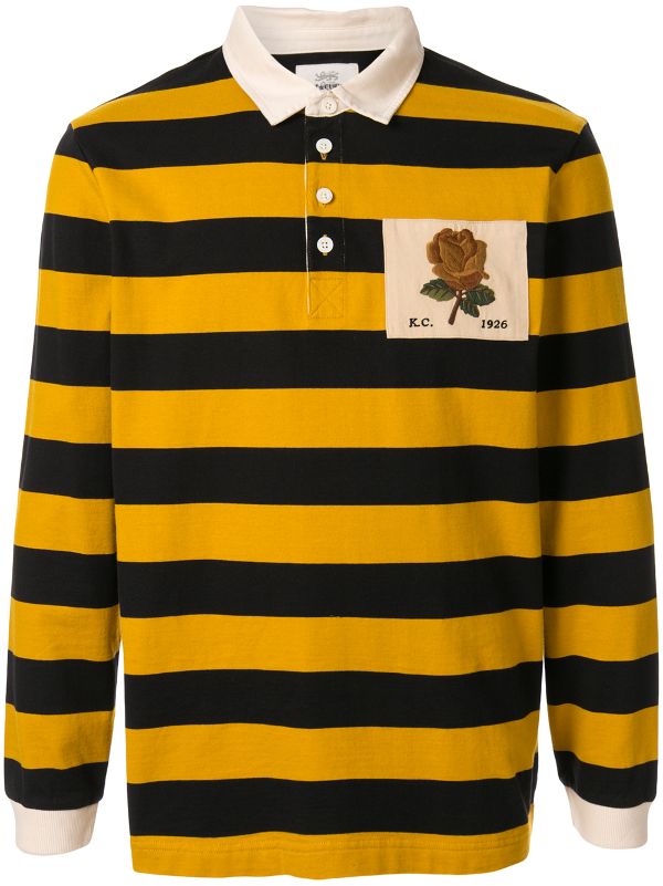 black and yellow striped polo shirt