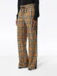 Burberry بنطال كاروهات مزين بساتان