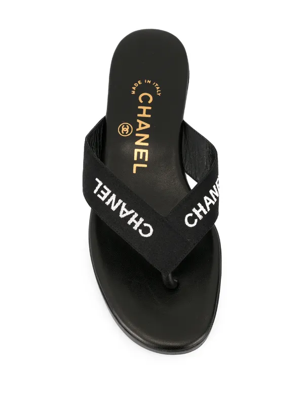 black chanel flip flops