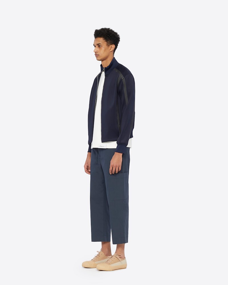 Track Jacket-blue #1 Track Jacket, Athleisure just got cooler! This track jacket from 3.1 Phillip Lim is a streetwear staple that can be perfect to transitioning into seasons. Spend your all day in supreme comfort. Featuring a funnel neck, a front zip fastening, long sleeves, ribbed cuffs, logo patch on the sleeve and contrast piping. POSITIVELY CONSCIOUS: This product is made with a certified eco-material or a recycled material that is better for the planet, so you can be confident you are choosing positively.- 1