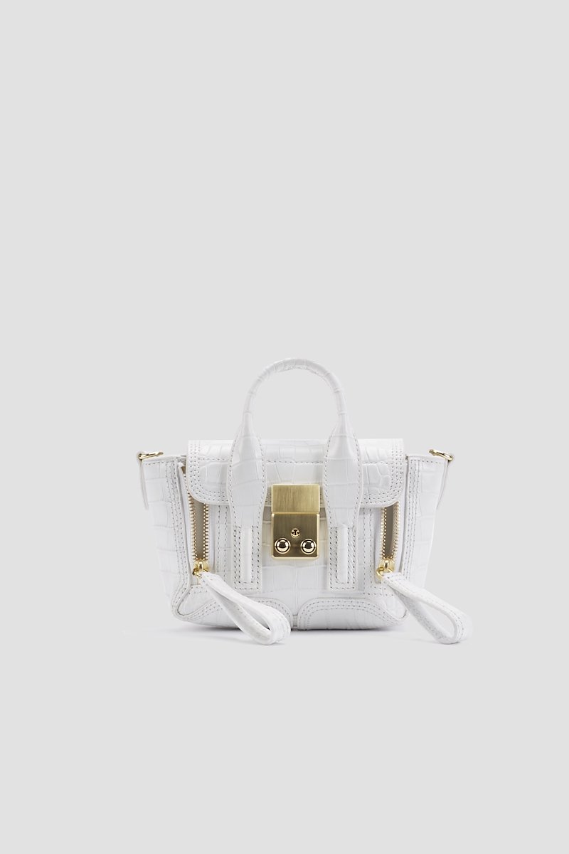 Pashli Nano Satchel-white #0 Pashli Nano Satchel, Need more proof that the best gifts in life come in the smallest of packages? This Pashli Nano crossbody bag from 3.1 Phillip Lim might just be what Shakespeare had in mind when he wrote: "though she be but little, she is fierce." It packs a punch - and your favourite lipstick. Featuring an embossed crocodile effect, gold-tone hardware, a chain and leather strap, a foldover top with magnetic closure and internal slip pockets.- 0