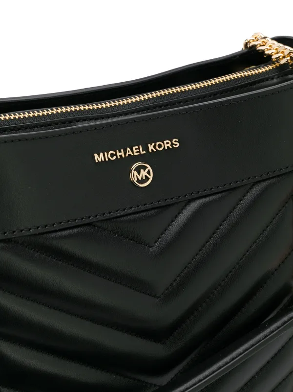 how to tell a real michael kors bolsa