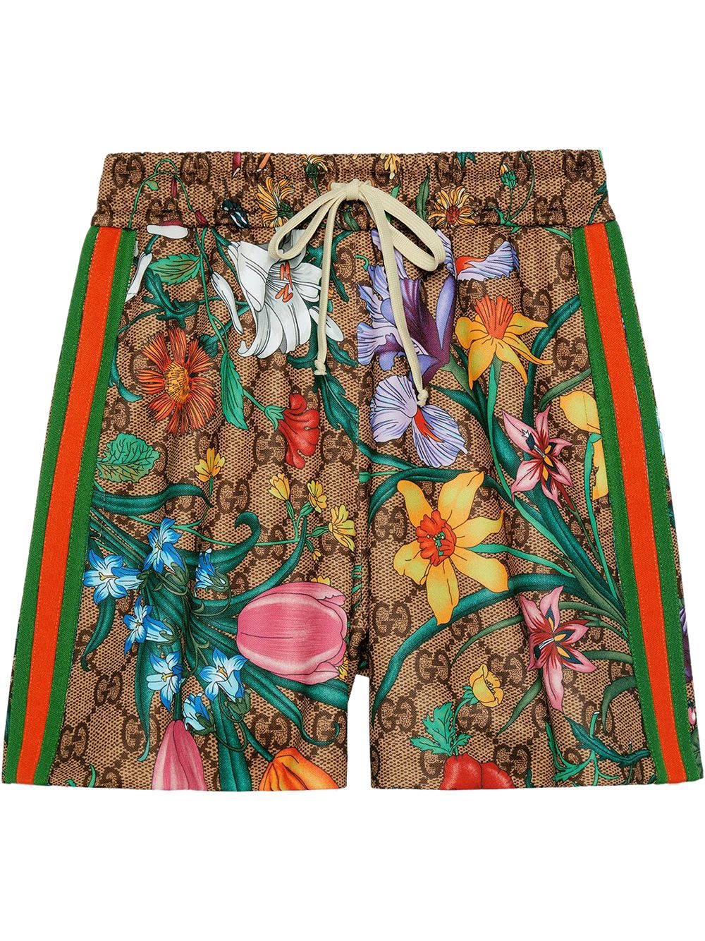 Shop green Gucci GG Flora print shorts 
