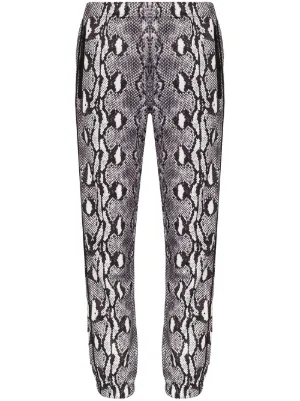 snakeskin-print track pants by Adam Selman Sport, available on farfetch.com for $169 Vanessa Hudgens Shorts SIMILAR PRODUCT
