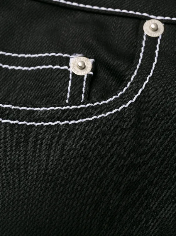 black straight leg jeans with white stitching