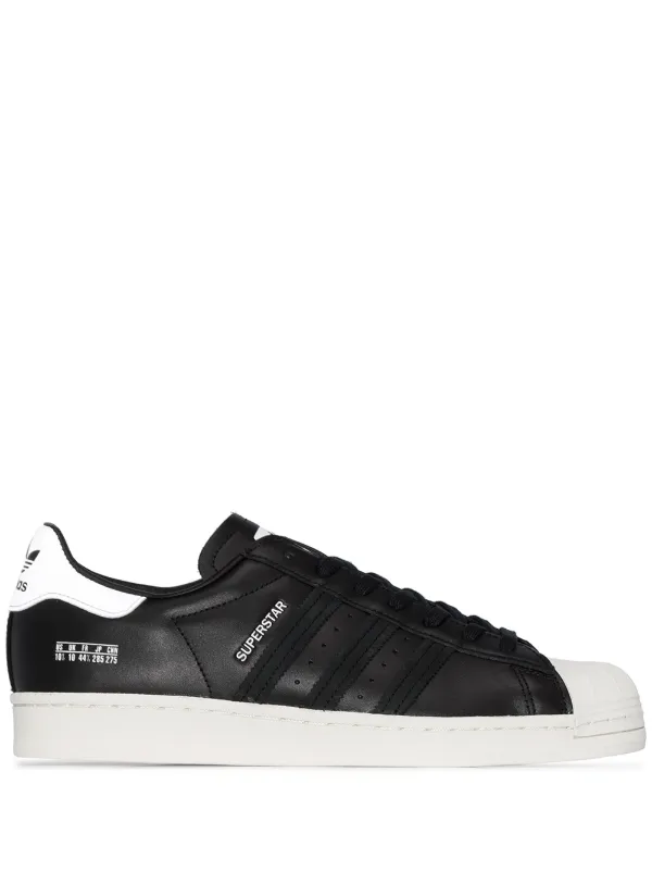 tenis adidas cano baixo