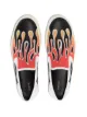 AMIRI Sneakers mit Flammen-Patches