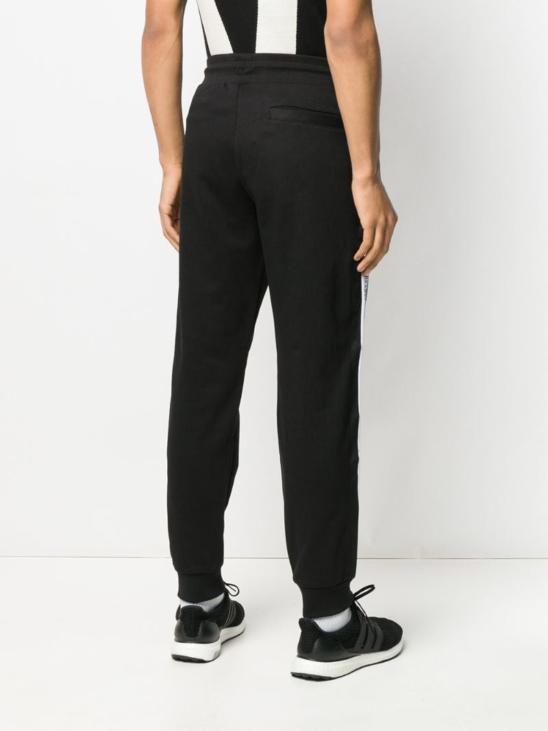 Shop Emporio Armani Logo Tape Track Pants In Black