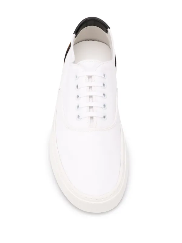 white sneakers leopard detail