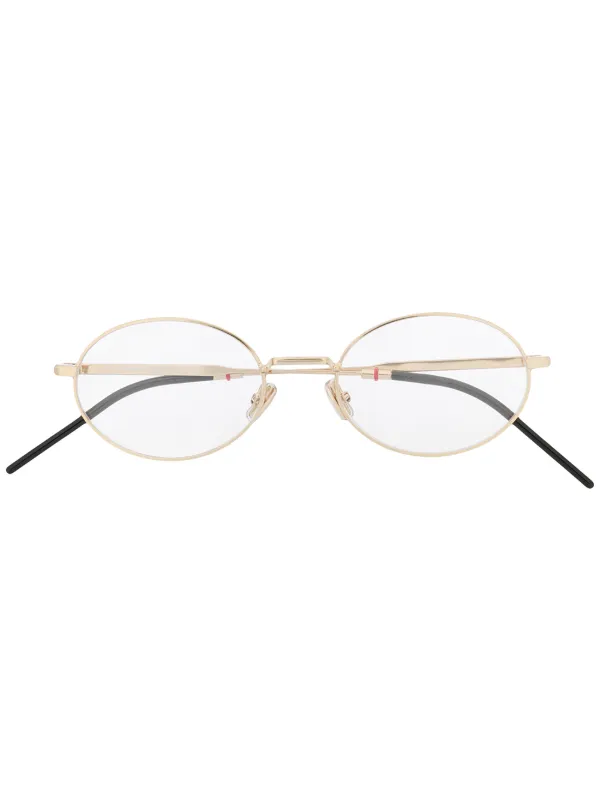 gold oval frame glasses