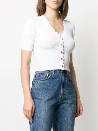 Shop white Sandro Paris cropped cardigan with Express Shop white Sandro Paris cropped cardigan with Express