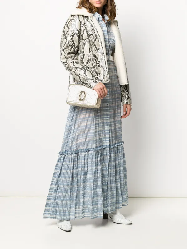 the status flap crossbody bag