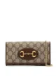 الصورة 1 من Gucci حقيبة كروس بنقش GG سوبريم وحلية معدنية