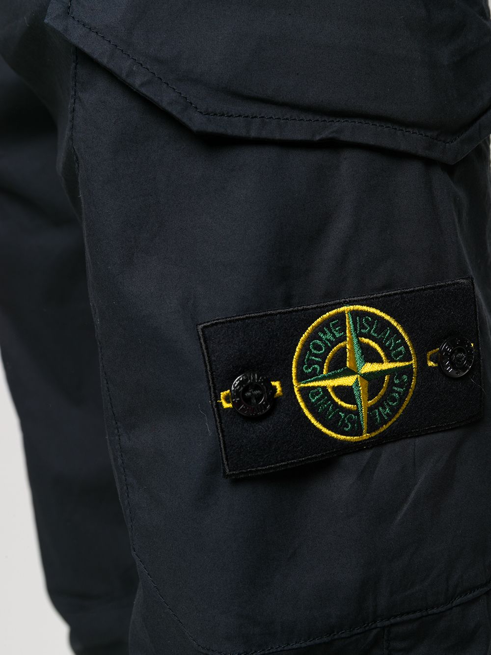 фото Stone island брюки карго кроя слим