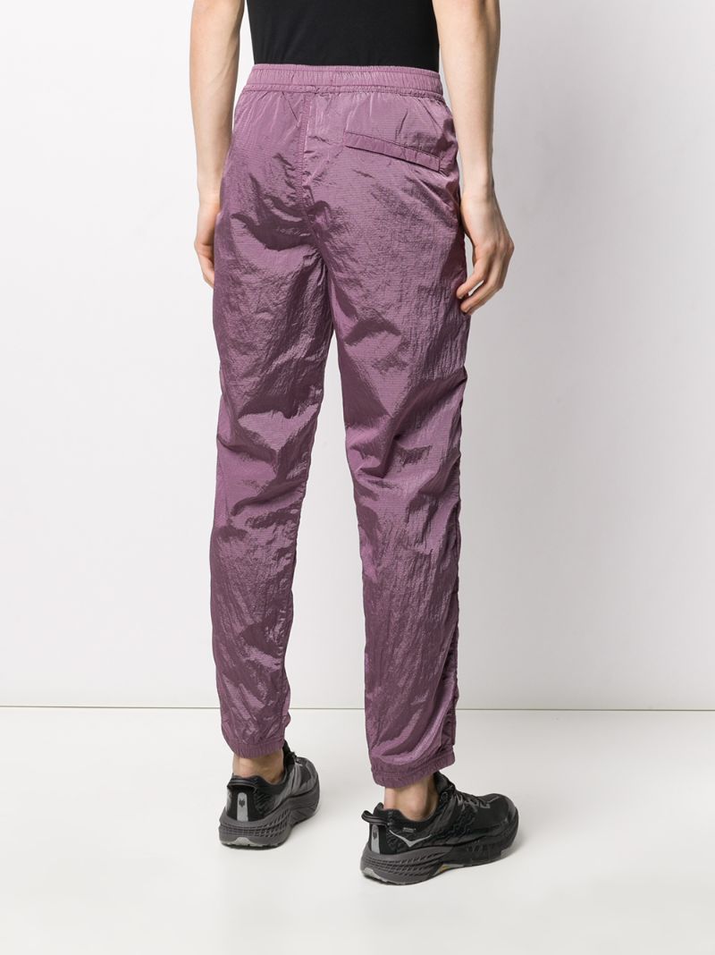 Shop Stone Island Logo Patch Track Trousers In Purple