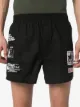 Raf Simons short à détails de patchs