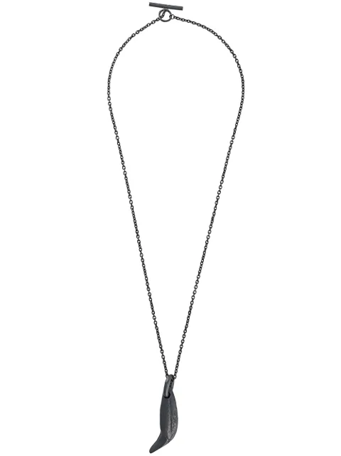 Parts of Four Bear Tooth necklace
