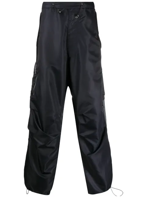 Random Identities pantalones impermeables