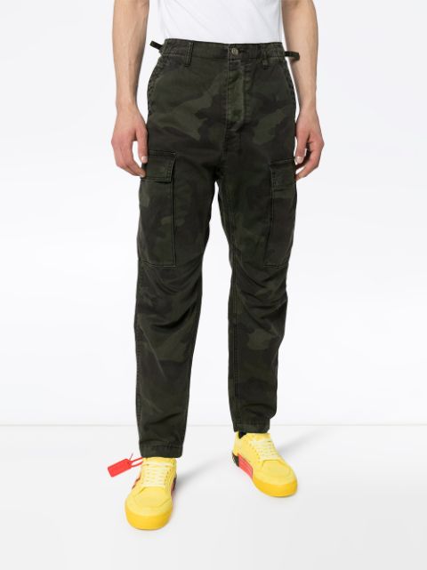 Shop black & green Ksubi Frequency camouflage cargo trousers with ...