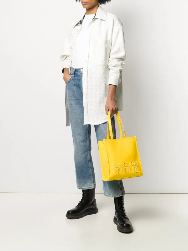 yellow logo rubber tote