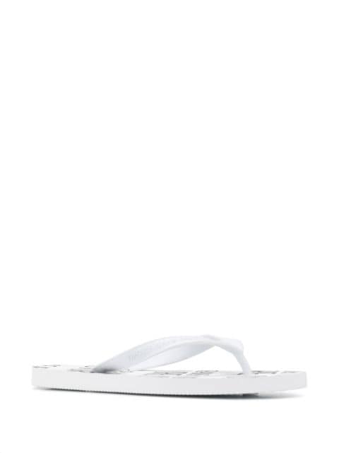 Shop white Versace Jeans Couture logo printed flip flops with Express ...
