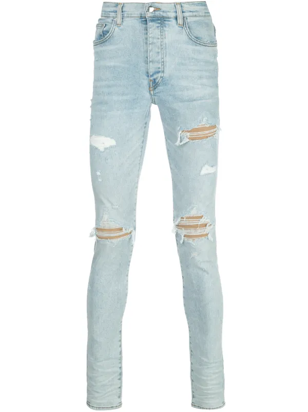 amiri distressed skinny jeans