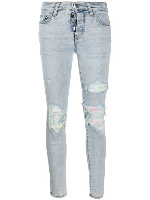 AMIRI RIPPED SKINNY JEANS