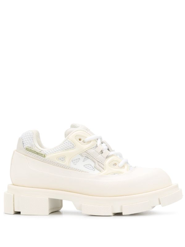 white chunky sole trainers