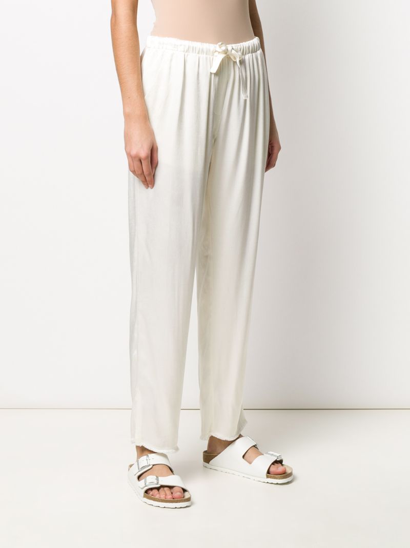 Shop Raquel Allegra Drawstring Tapered Trousers In White