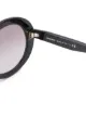 Miu Miu Eyewear نظارة شمسية بإطار مستدير