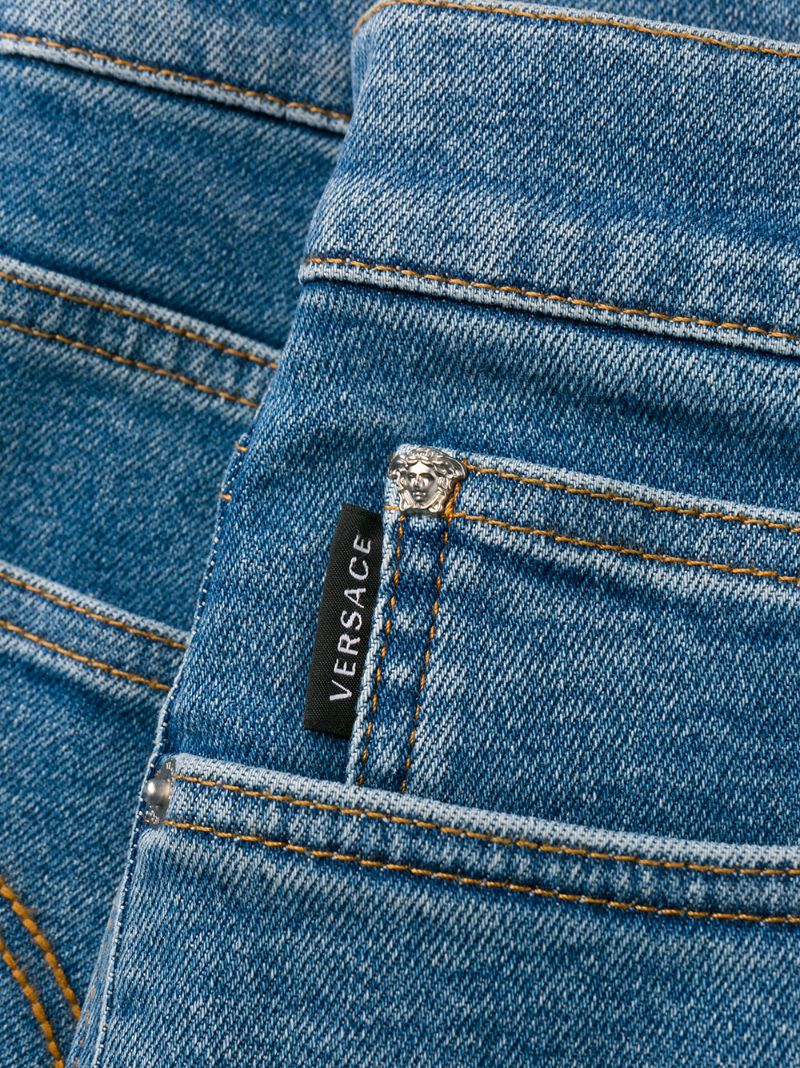 Shop Versace Straight Leg Jeans In Blue