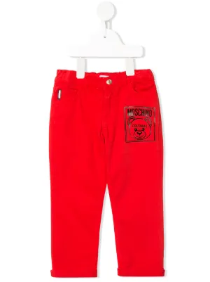 Moschino Kids جينز بأساور مطوية وشعار الماركة