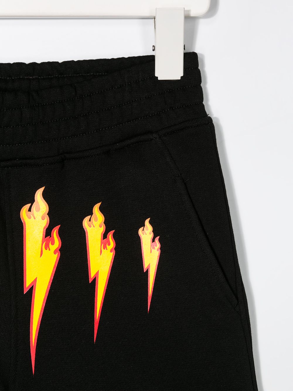 фото Neil barrett kids firebolt print elasticated waist shorts