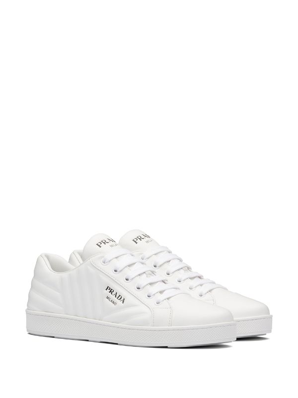 white quilted sneakers