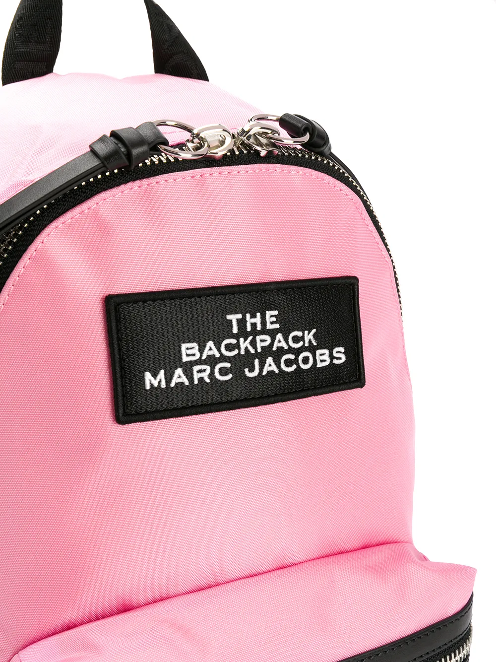 фото Marc jacobs zip strapped brand patch backpack