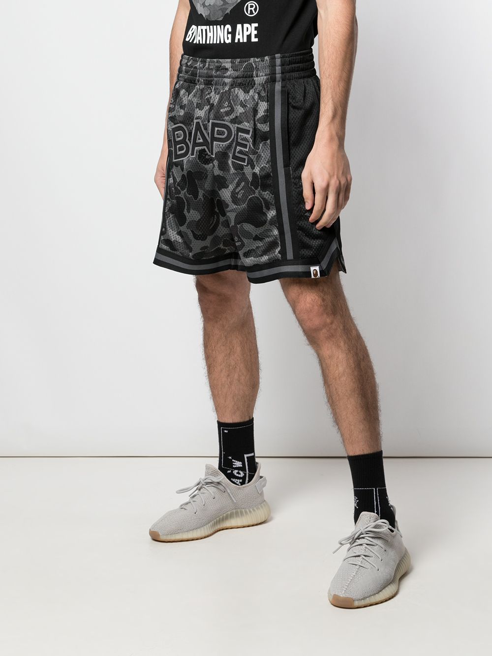 фото Bape x coach camouflage pattern shorts