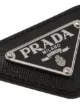 Prada enamelled triangular logo pin
