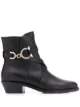الصورة 1 من Salvatore Ferragamo بوت كاحل بسبر ’غانشيني’
