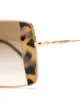 Miu Miu Eyewear tortoiseshell detail sunglasses