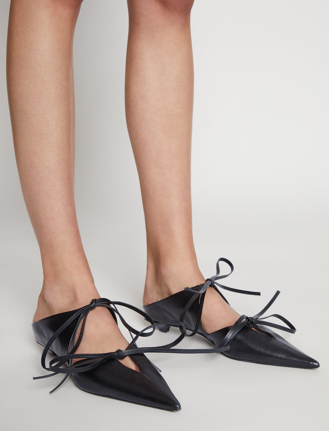 Tied Pointed Toe Kitten Heel Mules in black | Proenza Schouler