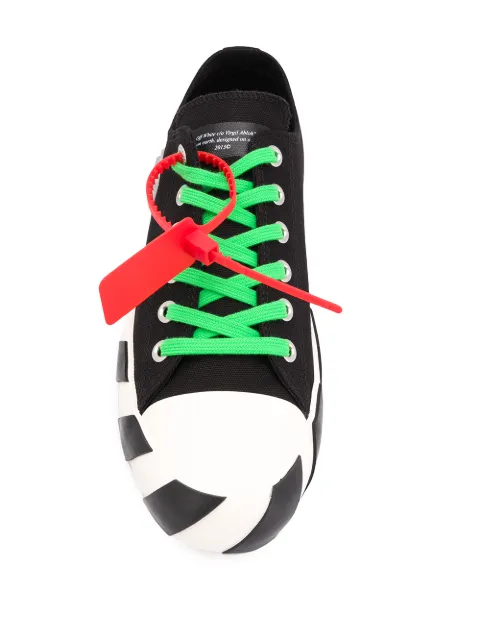 sneakers with arrow logo