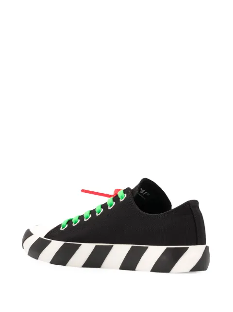 sneakers with arrow logo