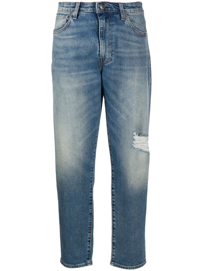 Shop Levi's Mid Rise Tapered Jeans In Blue