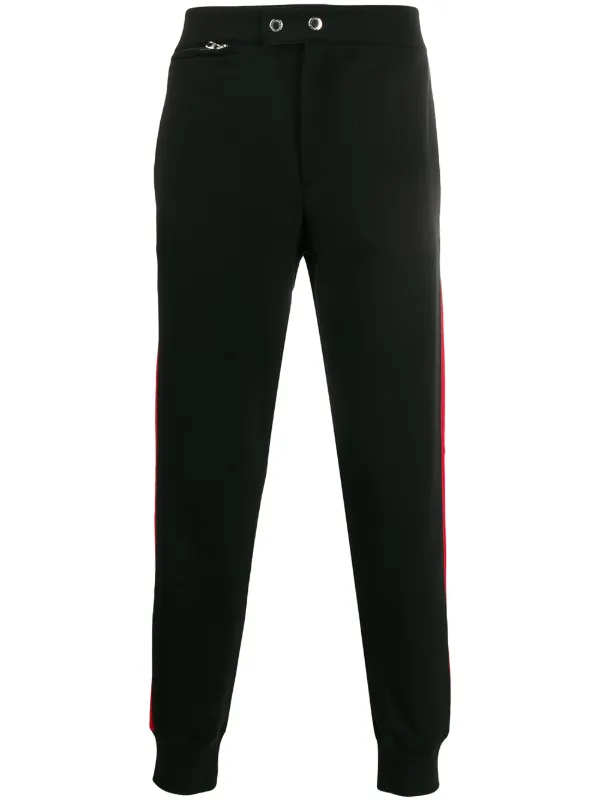 Shop Alexander McQueen side-stripe track pants with Express Shop Alexander McQueen side-stripe track pants with Express