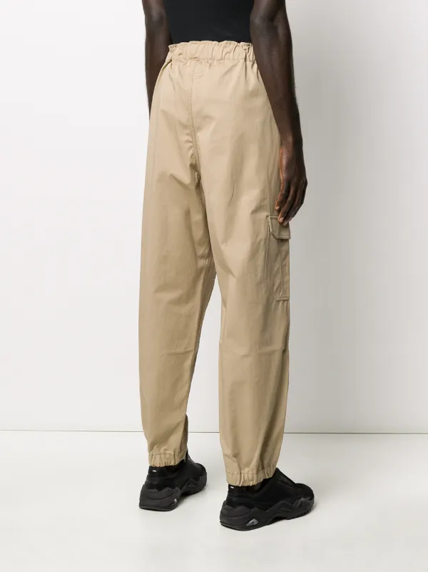 RANDOM IDENTITIES ランダムアイデンティティナイロンカーゴパンツ Random Identities カーゴパンツ | ニュートラル | FARFETCH JP