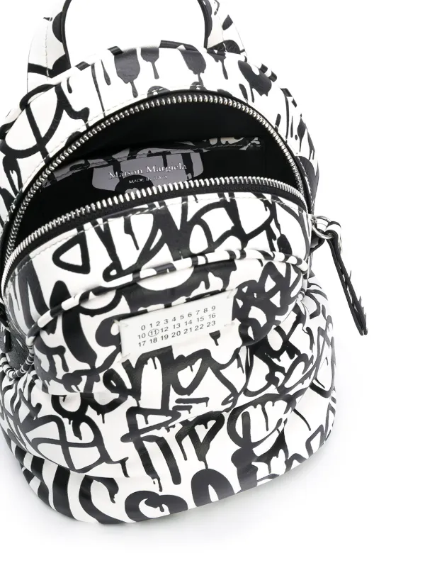 Maison Margiela Graffiti Print Backpack Ss20 Farfetch Com