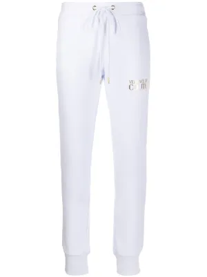 logo print track pants by Versace Jeans Couture, available on farfetch.com for $371 Gigi Hadid Pants SIMILAR PRODUCT