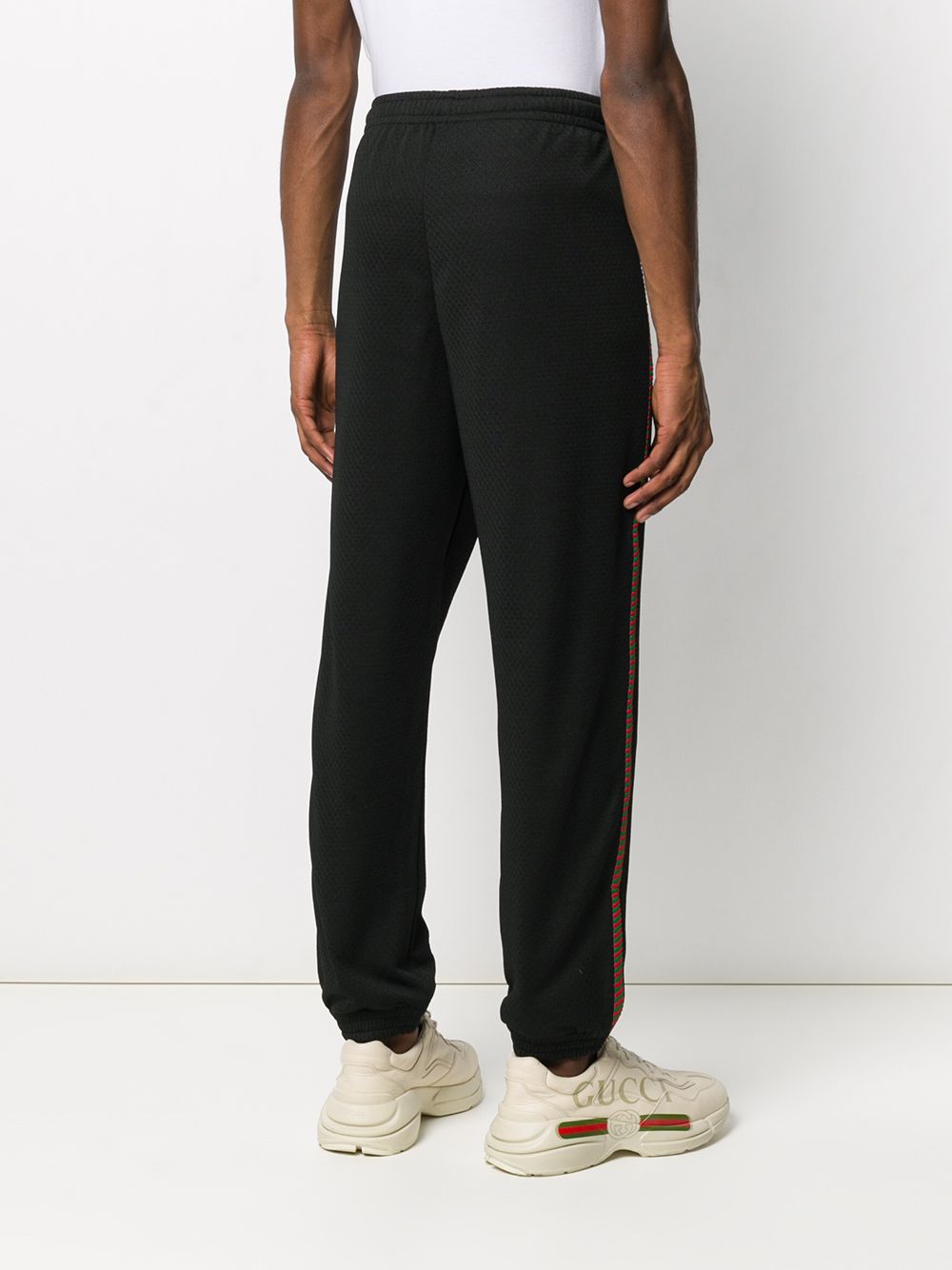 Shop Gucci Logo Embroidered Track Pants In Black