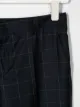 Paul Smith Junior بنطال كاروهات بأساور مطوية